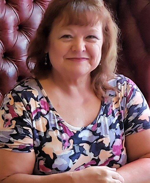 Professor Tammie Bolling seated at a restaurant in England