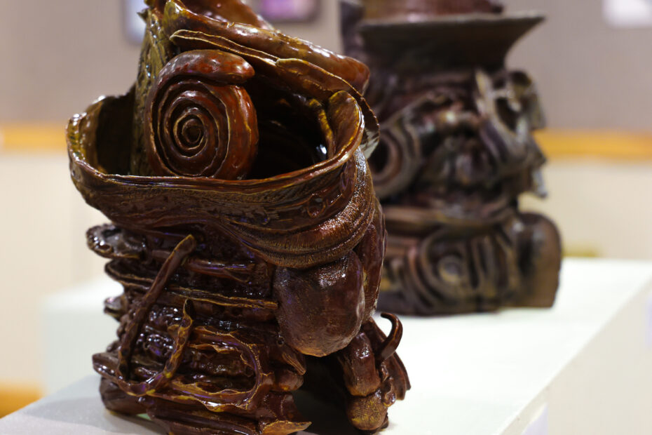 Two ceramic pieces in "Turn to the Fool" exhibit