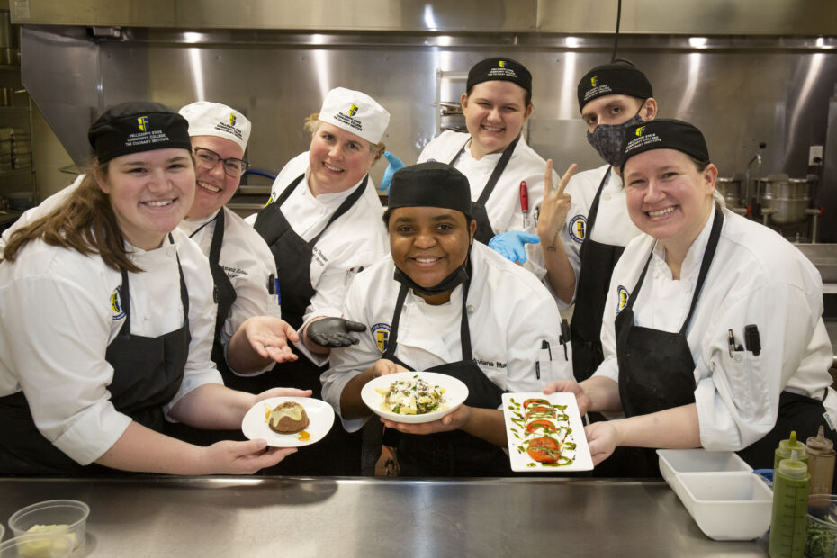 Pellissippi State Culinary Arts students and faculty show off some of the dishes they prepared for an International Luncheon on the college's Blount County Campus in March 2022.