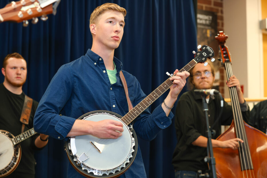 Pellissippi State students in Hardin Valley Thunder, the college's bluegrass band, rehearse in 2023.